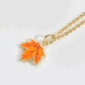 Vintage orange maple leaf necklace with gold metal trim and fine cable chain - Maple Leaf