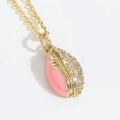 Rugby shaped gold pendant with pink oil drip and sparkling zircon inlay - Pink