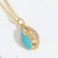 Golden football pendant necklace with lake blue enamel and sparkling zircon inlay - Lake Blue