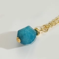 Minimalist necklace with a geometric hexagonal blue stone pendant on a gold chain - Blue