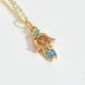 Gold resin necklace pendant with brown central stone and colorful floral details - Orange Blue