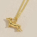 Poliertes goldenes Dackel-Anhänger-Halskette an einer zarten verstellbaren Gliederkette - Dackel / Gold