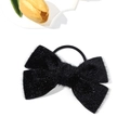 Elegant black plush faux mink bow hair tie for women with soft texture on white background - Black