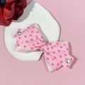 Sweet pink bow hair clip with heart prints and silver heart charms for women - Pink