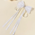 Elegante fermaglio per capelli con fiocco bianco, perla centrale e lunghi nastri - Bianco