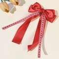 Elegant red satin bow hair clip with white lace trim and long flowing ribbons - Red