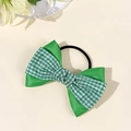 Detail of green plaid and satin double layered bow hair scrunchie with elastic band - Green