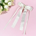 Fermaglio per capelli con fiocco a pois, perla e strass su sfondo rosa pastello - Beige
