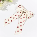 Detail of cream bow hair clip with red heart pattern and long satin streamers - 5# (Cream White Heart with Long Streamer)