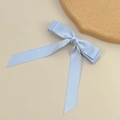 Detail of light blue satin double bow hair clip with long elegant flowing ribbons - Spring Clips / Blue