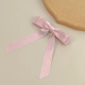 Detail view of the pink satin double-layered bow hair clip with elegant long ribbons - Spring Clips / Light Pink