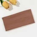 Detail showing the ribbed knit texture and elasticity of this brown wide sports headband - Coffee Brown (FD05-22)