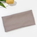 Detail of mauve ribbed knit elastic headband on white background with yellow tulip decor - Lotus Root Pink (FD05-25)