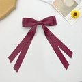 Detailed view of dark red satin double-layered bow hair clip with long ribbons - Burgundy