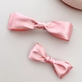 Set di due eleganti fermagli per capelli con fiocco in raso rosa in diverse dimensioni - Rosa