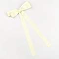 Detailed top view of a cream satin long tail bow hair clip on a minimalist white background - Beige with Ribbon