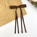 Close-up of deep brown satin ribbon hair clip with long streamers and elegant silk finish - Dark Brown