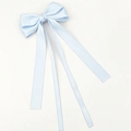 Detail of light blue satin bow hair clip with flowing ribbons and silky texture - Blue