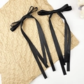 Par de elegantes horquillas con lazos de satén negro y cintas largas para mujer - Negro