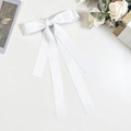 Close-up of white double-layered satin bow hairclip with long flowing silk ribbons - White