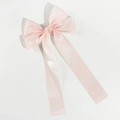 Macro detail of elegant pink mesh bow hair clip showing soft fabric texture and ribbon - Pink