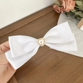 Eleganter weißer Schleifen-Haarclip mit perlenbesetztem Herz-Mittelstück Accessoire - Weiß