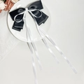 Elegante pinza de pelo con lazo blanco y negro y cintas largas en plato cerámico - Negro+Blanco