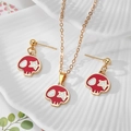 Detail of red alloy mummy skull jewelry set with necklace and earrings on white porcelain - Red Skull with White Star (B)
