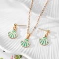 Macro view of shell pendant necklace and ball stud earrings in green enamel and gold - Green Shell Style (AN237)