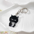 Porte-clés chat noir en acrylique avec expression fâchée et tasse à étoiles mignon - Chat Noir