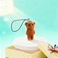Portachiavi con orsetto di peluche marrone con clip in metallo su sfondo regalo azzurro - Stile con Cordino Nero