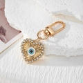 Portachiavi a cuore dorato con motivo occhio turco e strass brillanti incastonati - Cuore con Strass Oro