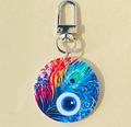 Acrylic evil eye keychain with colorful peacock feather patterns and silver clasp - Colorful Round Evil Eye Keychain