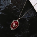 Gothic vintage silver spider necklace with dark red oval pendant and filigree lace details - Red Spider Necklace