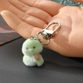 Simpatico portachiavi a forma di serpente verde chiaro in morbido peluche con gancio argento - Serpente Verde Lingotto