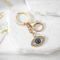 Detailansicht des Evil Eye Schlüsselanhängers mit Vergoldung und Strasssteinen - Gold Hohl Schräges Auge (3)