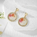 Elegant gold heart earrings with resin round pendants containing real colorful dried flowers - Pink Orange White Flowers Crushed Stone Style