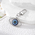 Turkish Evil Eye keychain with blue crystal star charm and rhinestones in silver finish - Silver Openwork Eye