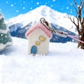 Cute pink felt snow house charm with heart decor and silver clasp on a winter snow background - Red House (Phone Rope)