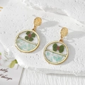 Pendientes dorados hechos a mano con trébol de resina y piedras azules trituradas - Cuatro Hojas Piedra