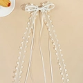 Lazo blanco estilo balletcore para el pelo con encaje de corazones y cintas de tul - Blanco Roto