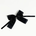 Detail of layered black satin mesh bow hair clip with long ribbons for elegant styling - Black