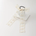 Elegante elastico per capelli in pizzo crema con fiocchi lunghi per acconciature a coda - Beige