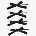 Set di quattro fermagli per capelli a fiocco in raso nero con spilli in metallo su bianco - Nero