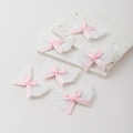 Set de 6 pinzas para el pelo de alas de ángel con lazos de seda rosa y purpurina blanca - Rosa