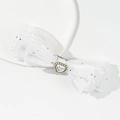 Detalle de pinza de lazo de satén blanco con perla de corazón y diamantes de imitación - Blanco