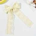 Elegant cream bow hair clip with long lace ribbons and delicate floral embroidery - Beige