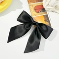 Elegant large black satin bow hair clip for women with a smooth and glossy silk texture - Black