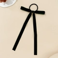 Detalle de coletero de terciopelo verde oscuro con lazo y cintas largas elegantes - Negro