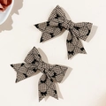 Close-up of brown plaid bow hair clips with black patterns and vintage ribbon detail - 1# (Single)